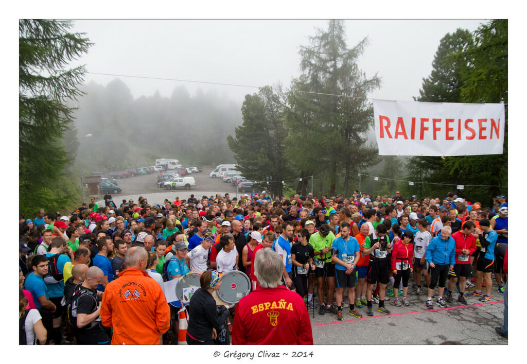 The tourist division gets ready for action. Note the remarkably gray view. It was the wettest July in 60 years in the Valais canton, where the race is held.