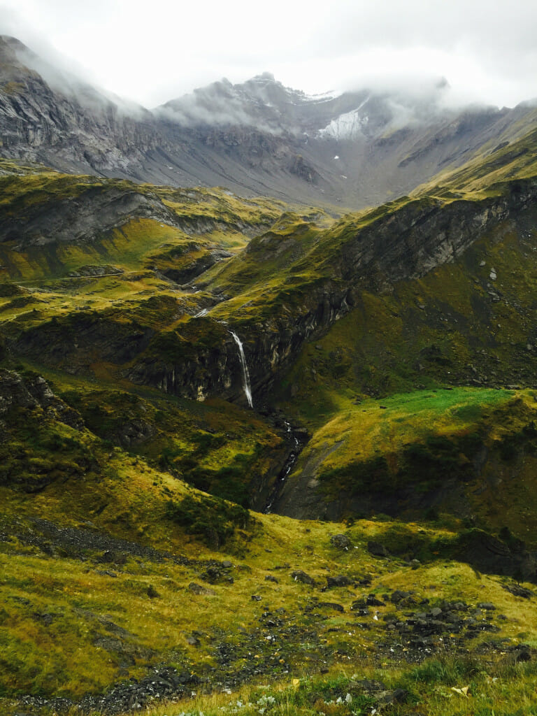 Fast cruising through high alp pastures makes up much of the first half of the Trail DM course. (Photo courtesy of Karen Connolly.)