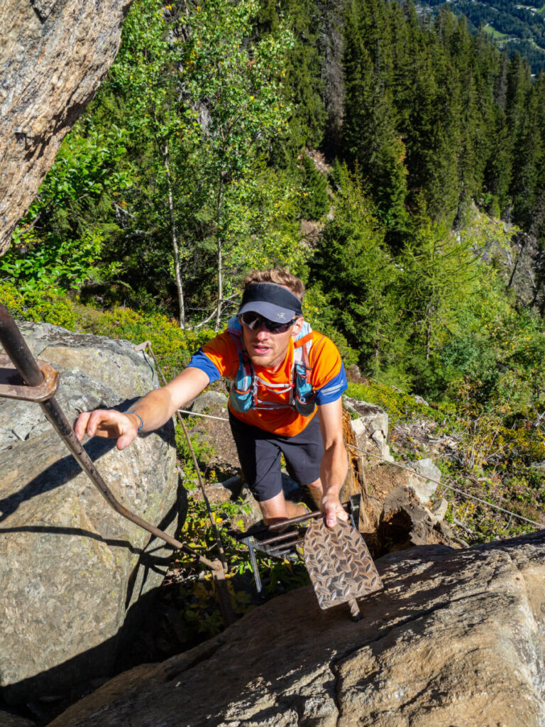 Trail runner on some fixed equipment towards the top of the KV Chamonix