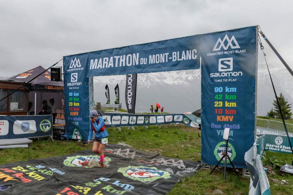 Jen Stretton crosses finish line.