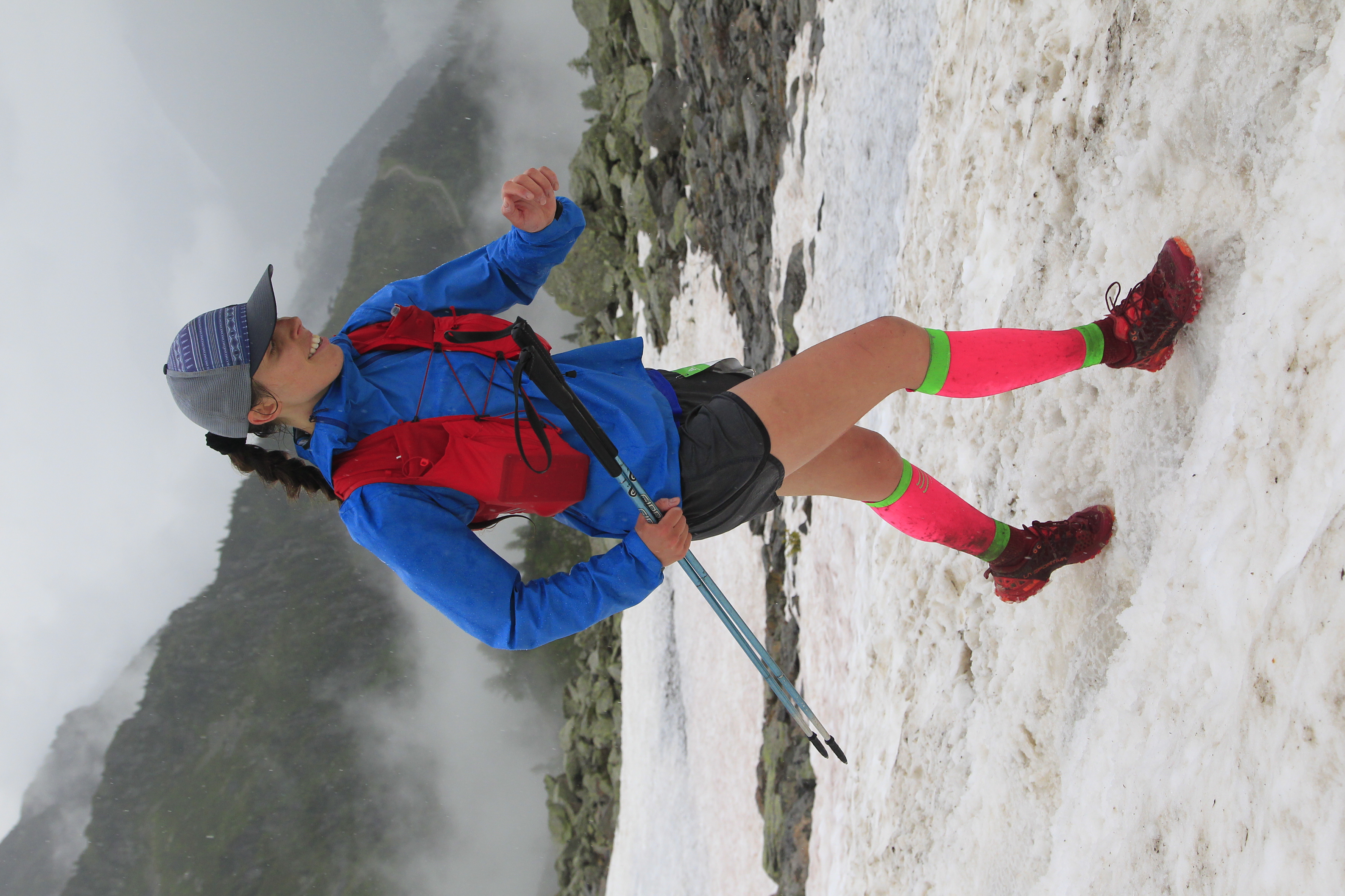 Jen Stretton running on snow in foul weather